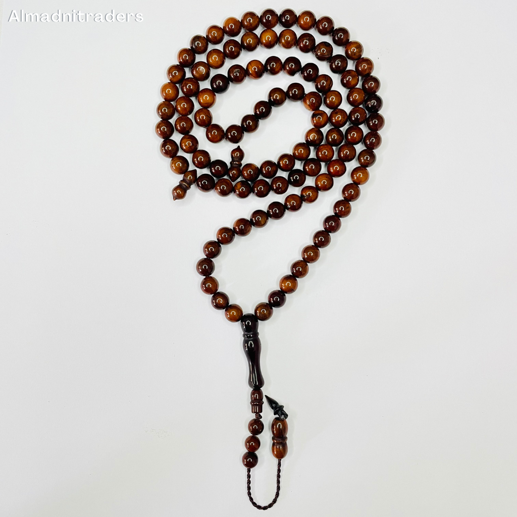 "Traditional Kokka Wood Tasbeeh on a neutral background"