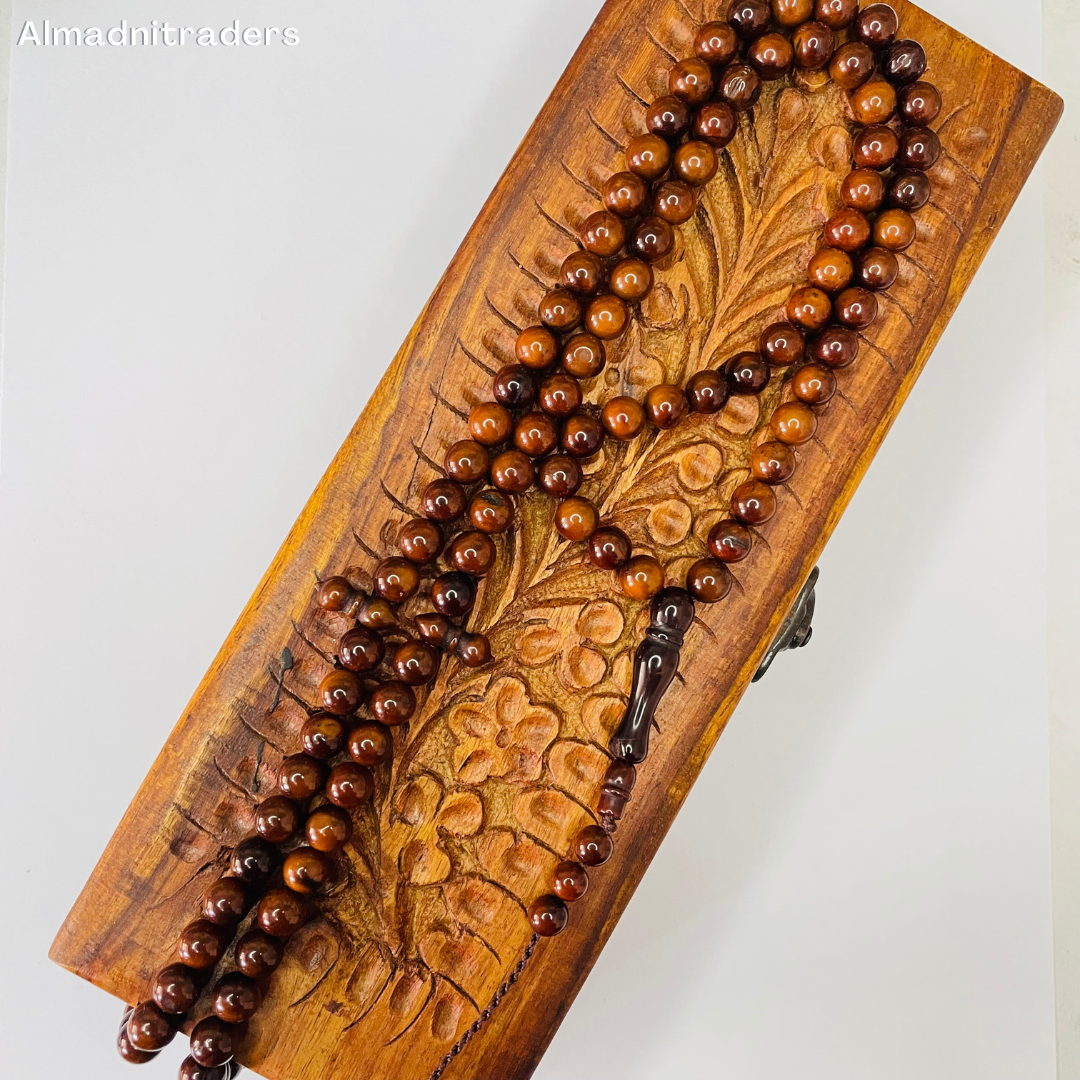 "Handcrafted Kokka Wood Tasbeeh with smooth, polished beads"