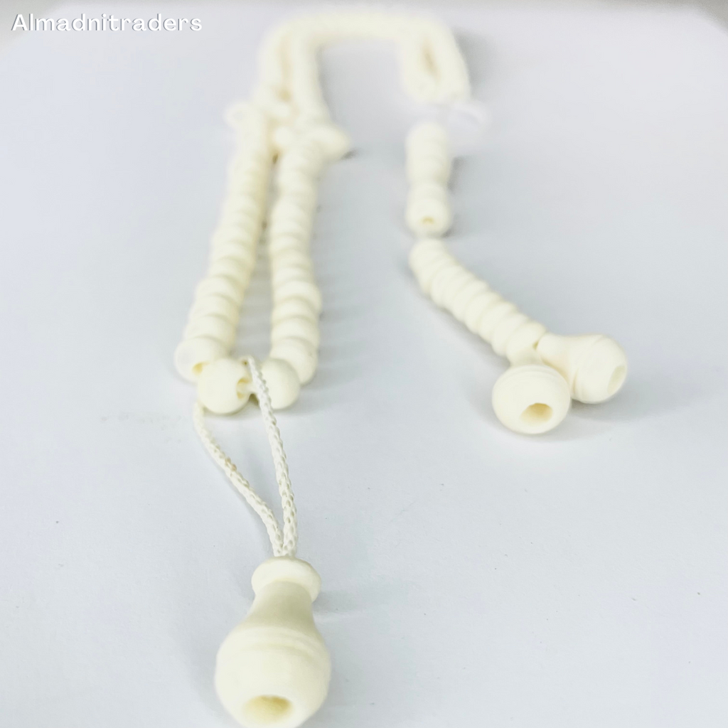 "Camel Bone Handcrafted Tasbeeh - Close-up of intricate beadwork"