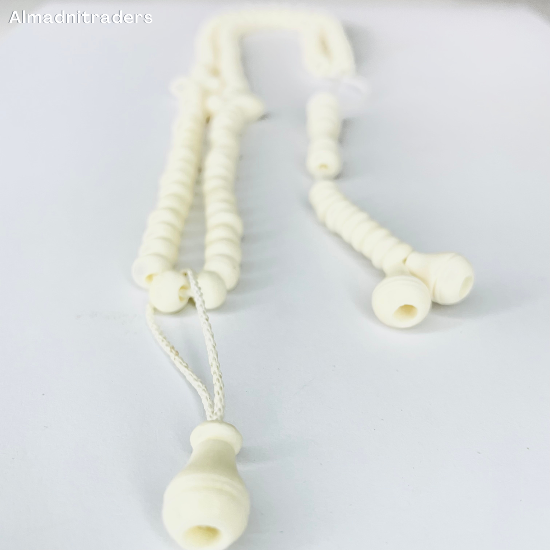 "Camel Bone Handcrafted Tasbeeh - Close-up of intricate beadwork"